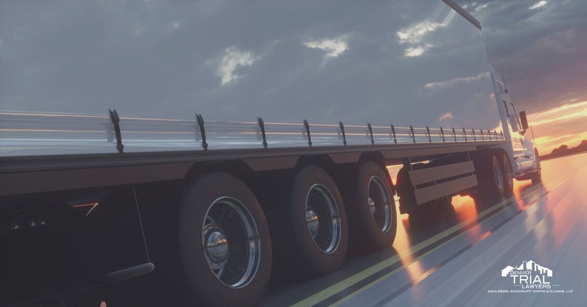 Large tractor trailer on the road.